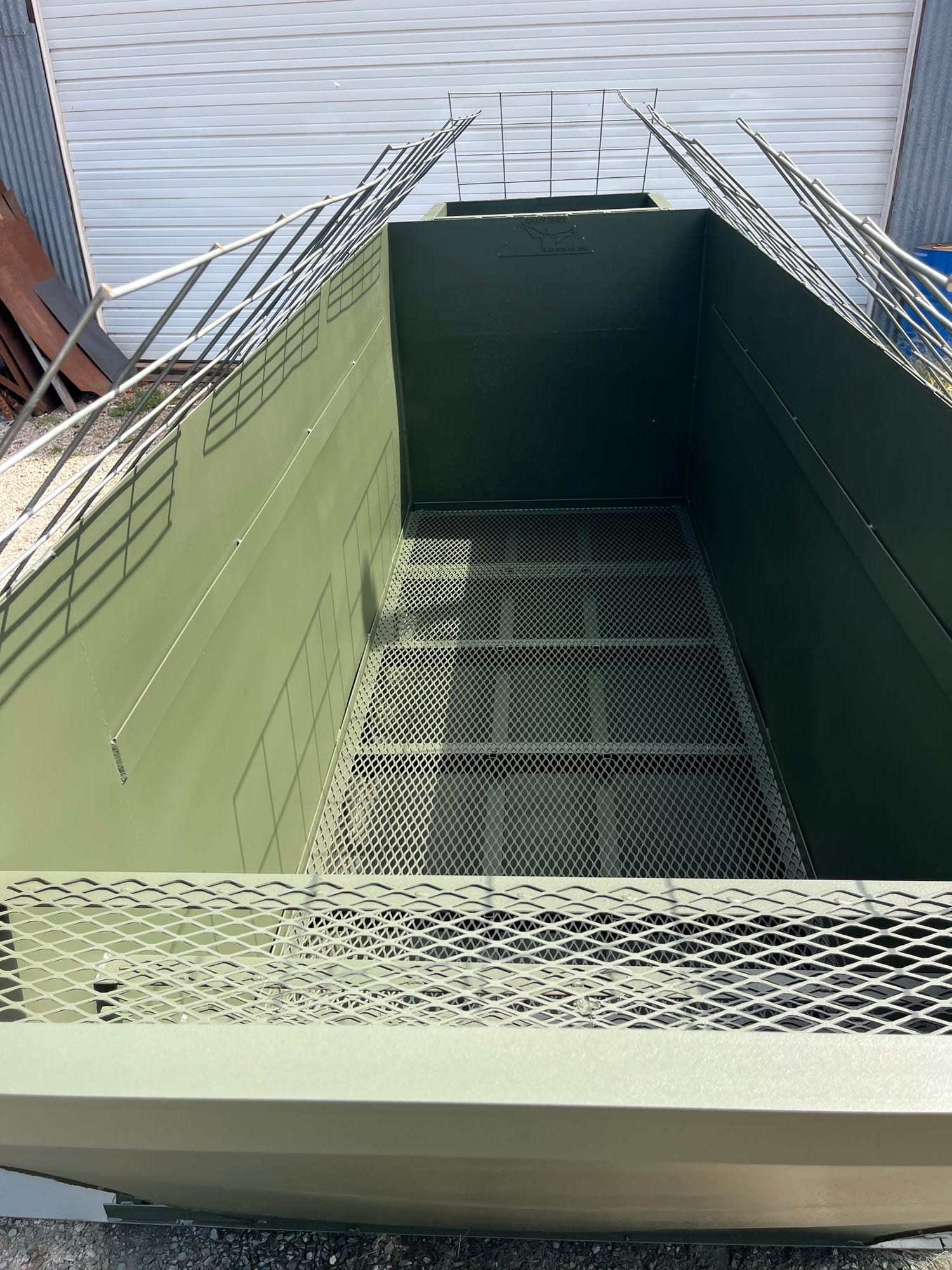 Pit blind interior showing expanded metal walls and spacious floor — The Whack Shack