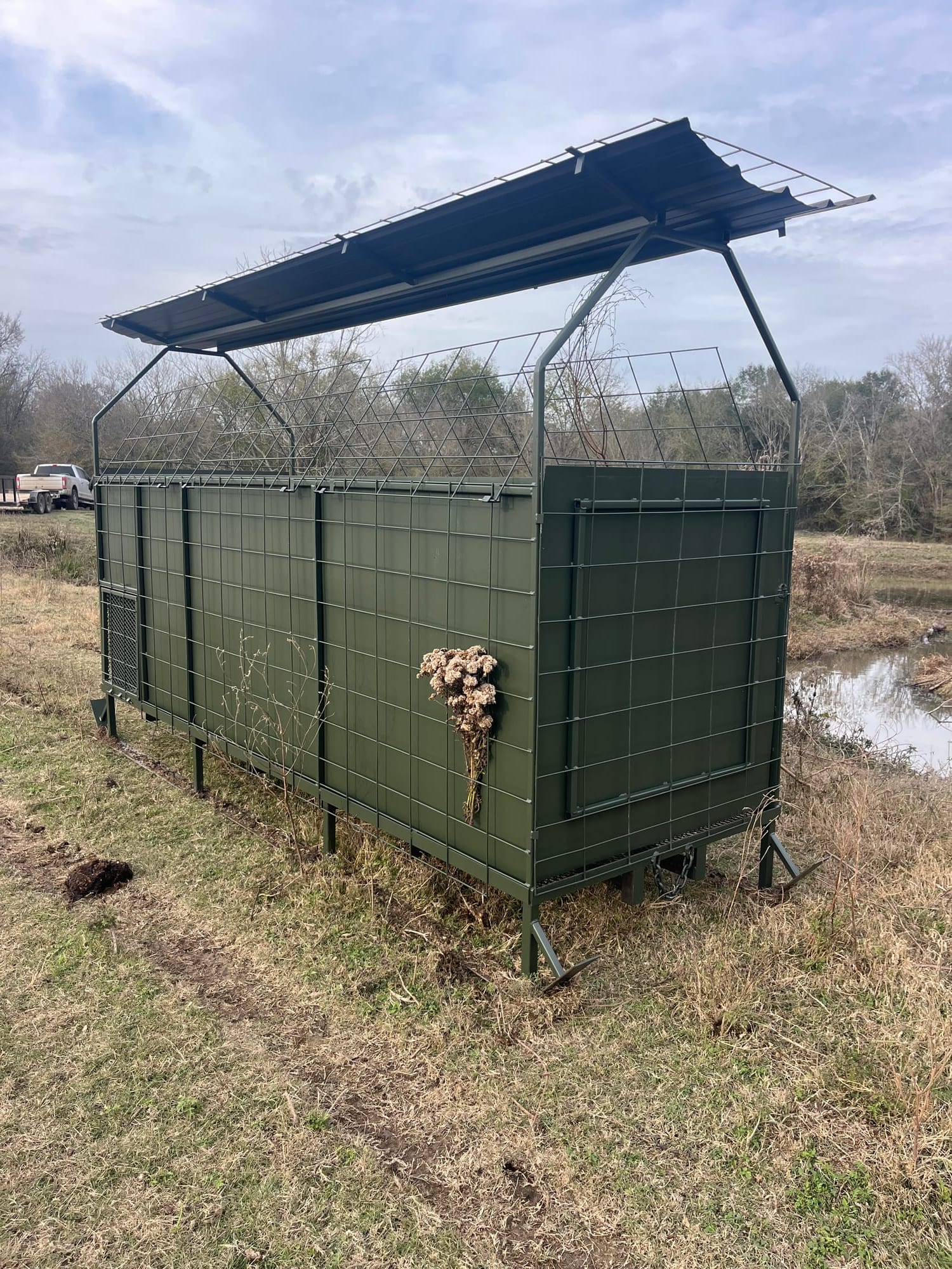 Skid blind exterior from side angle showing steel panel construction