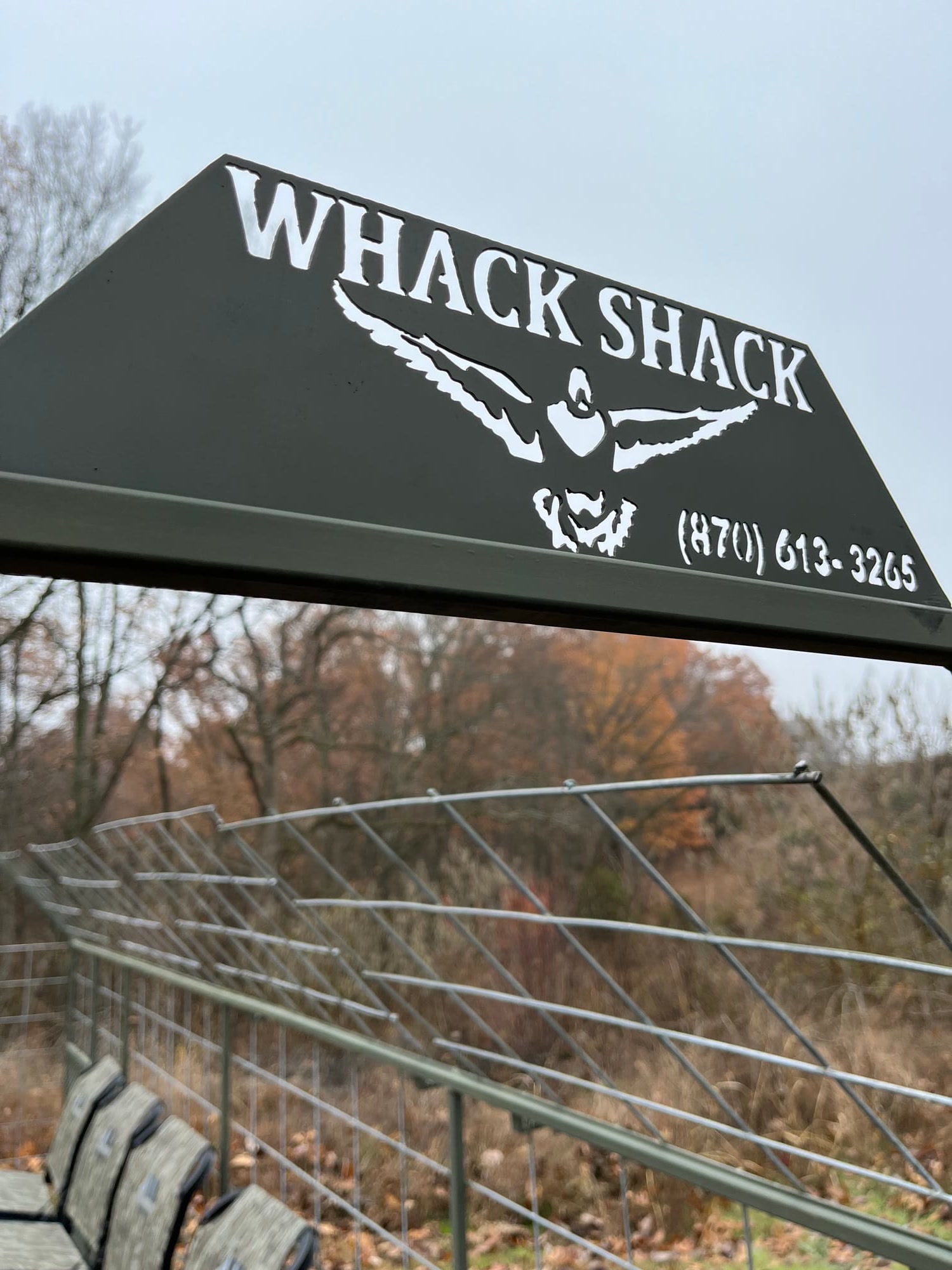The Whack Shack branded logo on a custom steel duck blind in Arkansas